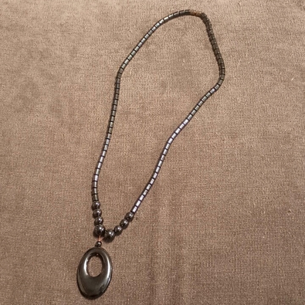 5/$20 Magnetic Synthetic Hematite Open Oval Pendant Necklace